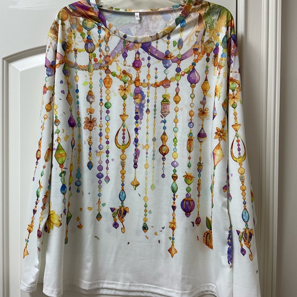 Ladies multi color jewel blouse.